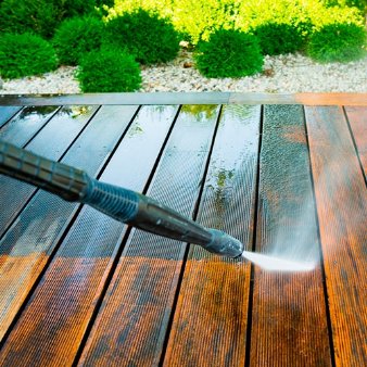 deck medic water spray tool on wood